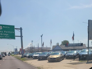 Rows of homes along the highway. Many of these are perfect to offer as a cash for home Tacony based seller.