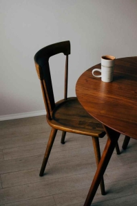 Chair, table and mug used in professional staging of house.  Joey Loves Philly offering  cash for house Philly is a popular way to sell a house for cash in Philadelphia. 